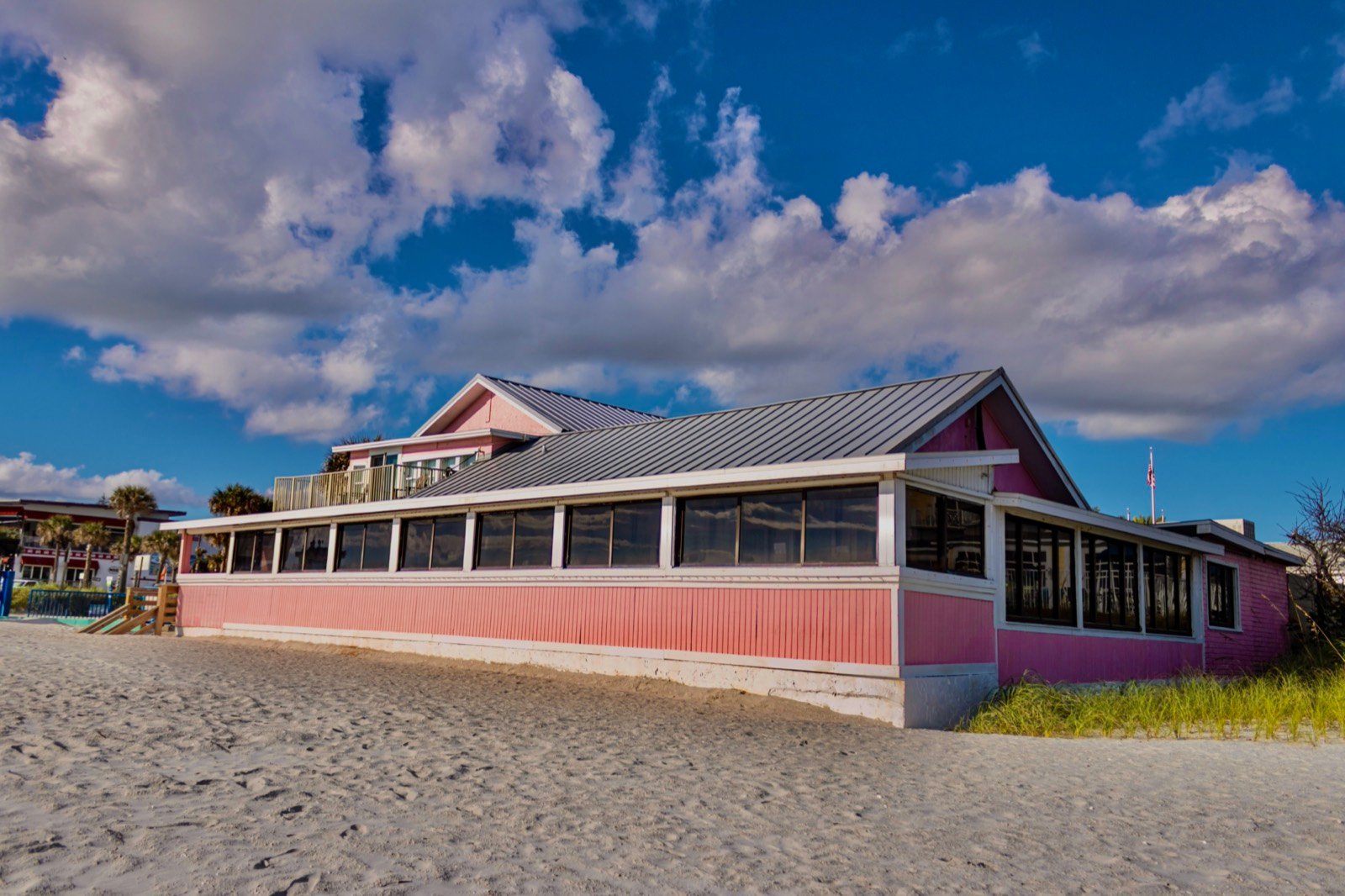The Breakers building viewed from the beach, with the Atlantic Ocean in the foreground