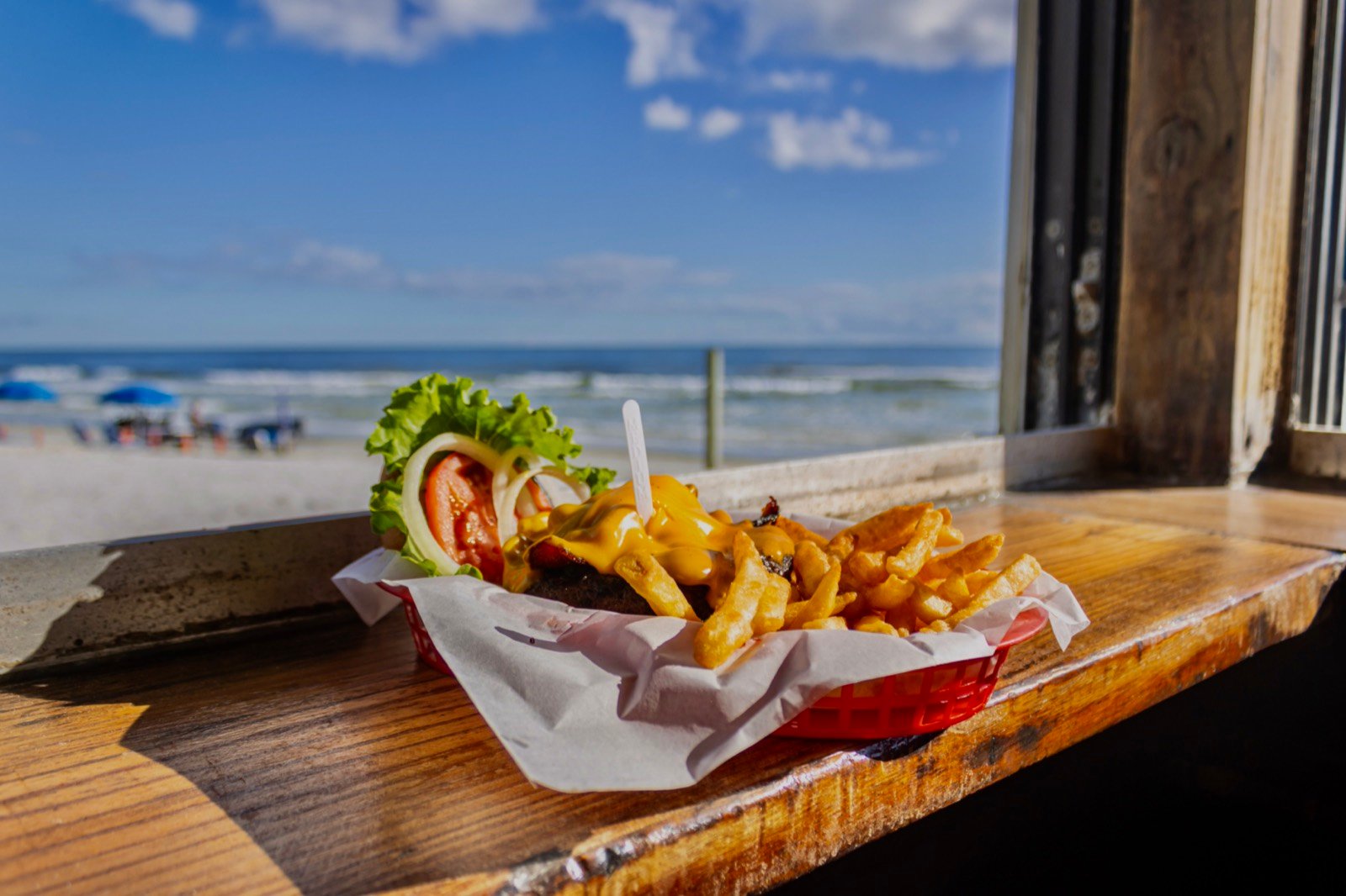 A Breakers burger plated with fries
